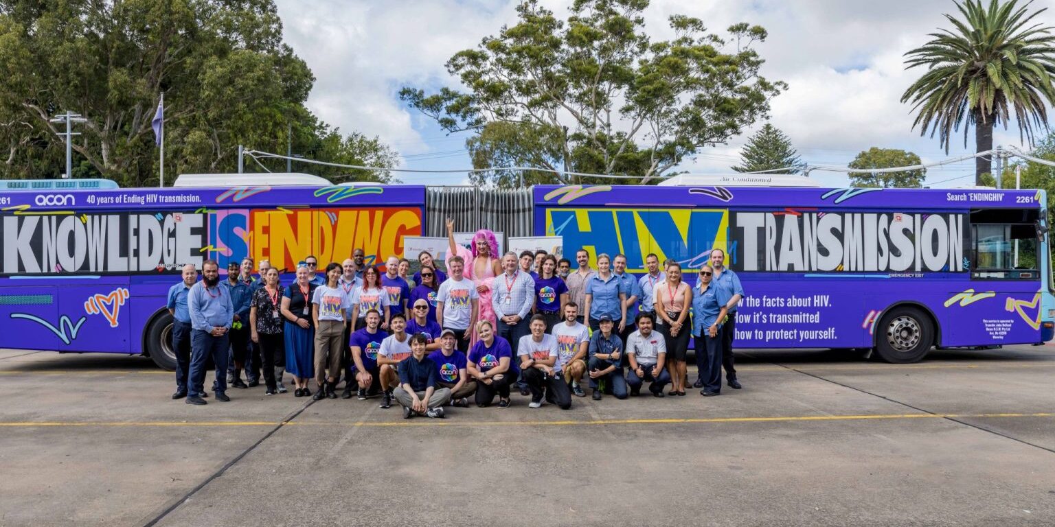 Transdev Australia team in front of end HIV transmission bus